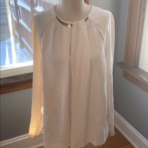 Cream colored blouse